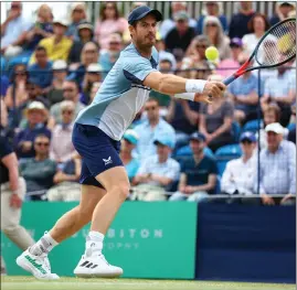  ?? ?? Andy Murray stretches to return a shot during his win yesterday