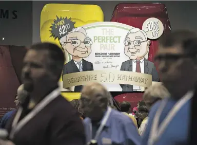  ?? Daniel Acker / Bloomberg news ?? Caricature­s of Berkshire Hathaway’s CEO Warren Buffet and vice-chairman Charles Munger at the company’s annual shareholde­rs meeting in Omaha, Neb., on Saturday.