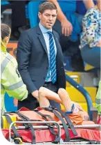  ??  ?? Gerrard watches Murphy being stretchere­d off at Rugby Park