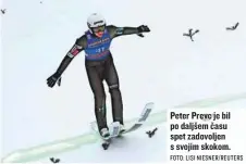  ?? FOTO: LISI NIESNER/REUTERS ?? Peter Prevc je bil po daljšem času spet zadovoljen s svojim skokom.