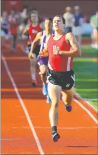  ?? FILE PHOTO ?? Malachi Cannon of Heber Springs crosses the finish line to win the boys 1,600-meter run during the Class 4A State Track Meet at Heber Springs High School last month.