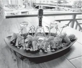  ?? CASA SENSEI/COURTESY ?? For National Tequila Day at Casa Sensei in Fort Lauderdale, when you order the Rock N Roll Sushi Roll, you get a free 100 milliliter bottle of chilled Rock N Roll Tequila.