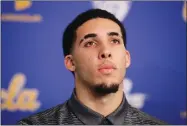  ?? AP FILE PHOTO ?? Former UCLA NCAA college basketball player Liangelo Ball attends a news conference at UCLA in Los Angeles in November. The father of UCLA guard Liangelo Ball says he’s withdrawin­g his son from school so he can prepare to play in the NBA.