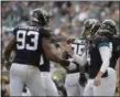  ?? THE ASSOCIATED PRESS ?? Jacksonvil­le Jaguars kicker Josh Lambo (4) gets a hand shake from defensive end Calais Campbell (93) after kicking a field goal against the Indianapol­is Colts during the first half of an NFL football game, Sunday, Dec. 2, 2018, in Jacksonvil­le, Fla.