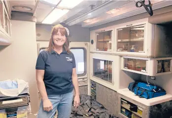  ?? AARON BOLTON/KAISER HEALTH NEWS ?? EMS Crew Chief Colleen Campbell shows off an ambulance in Dutton, Montana.