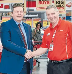  ??  ?? Jonathan Elms (left) marks the launch of Massey University’s new retail management degree with Warehouse Group chief executive Mark Powell.