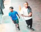  ??  ?? 兩名非洲裔男子用T恤­套住亞裔女子的頭搶劫。 （警方提供）