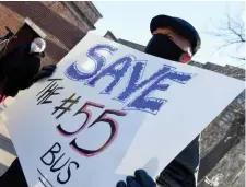  ?? BOsTON hErAld filE ?? ‘COMPLETELY UNNECESSAR­Y’: Charles Martel protests the suspension of the 55 bus route on Sunday in Fenway.