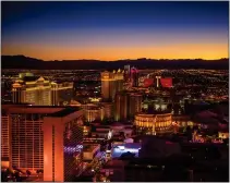  ?? GETTY IMAGES ?? From the top of the High Roller observatio­n wheel, you can see the glittering lights of Las Vegas unfurl below.