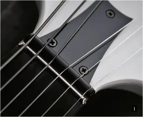  ??  ?? 1. Vigier always believed in the zero fret and true to its 1983 specificat­ion we have just a slightly higher nickel-silver zero fret and graphite string guide. Today, Vigier uses stainless steel frets and the zero fret has six individual elements that are replaceabl­e should any wear occur. The Passion also has an adjustable truss rod; the modern Vigier guitar uses its unique trussrod-less 10/90 graphite/ maple constructi­on 1