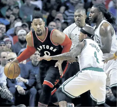  ?? CHARLES KRUPA/THE ?? Toronto Raptors center Jared Sullinger (0) is trailed by Boston Celtics guard Isaiah Thomas (4) and forward Jae Crowder during the first quarter of an NBA basketball game in Boston, on Wednesday.