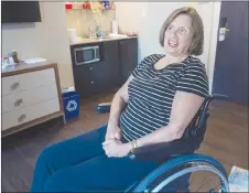  ?? CP PHOTO ?? Maureen Dares is seen in a hotel room at the Lord Nelson Hotel in Halifax. The 58-year-old woman with multiple sclerosis and epilepsy is among about 912 people in this part of Nova Scotia awaiting a nursing home spot.