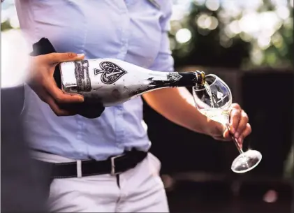  ??  ?? CELEBRITY OWNED: Jay-Z on Armand de Brignac’s Champagne