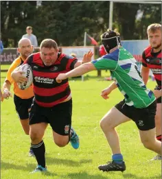  ??  ?? No stopping Patrick Brennan as he charges towards the Gorey line.