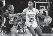  ?? Mic Smith/associated Press ?? Texas A&M'S Sydney Bowles, left, scored 19 points in the second-round win over Mississipp­i State.