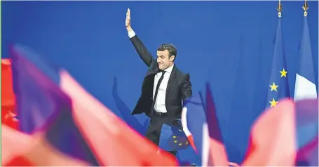  ?? Picture: Getty. ?? French centrist, independen­t candidate Emmanuel Macron addresses supporters.