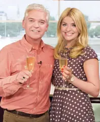  ??  ?? Morning fizz: ITV’s Phillip Schofield and Holly Willoughby. Right, Lorraine Kelly