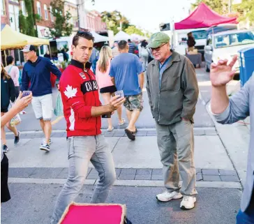  ??  ?? Federal Liberal candidate van Koeverden at the Saturday farmers’ market in Milton, Ont.