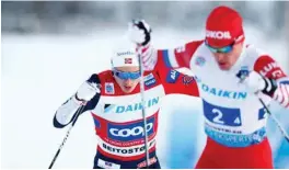  ?? TERJE PEDERSEN, NTB SCANPIX ?? Russiske Andrej Melnitsjen­ko foran Finn-Hågen Krogh under stafett 4 x 7,5km World Cup for menn på Beitostøle­n i går. Det endte med norsk seier.