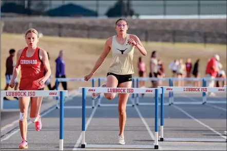  ?? Photo Credit Patrick Gonzales/big Spring Herald ?? Big Spring’s Alexa Mehan (middle) competing back on March 28th at the Lubbock Invitation­al. Mehan recently captured gold in varsity girls 100 meter hurdles at the District 5-4A meet this past Thursday in San Angelo. Mehan also qualified in the 300 meter hurdles, long jump, and triple jump for the Region I District 5&6 Area meet in Abilene.