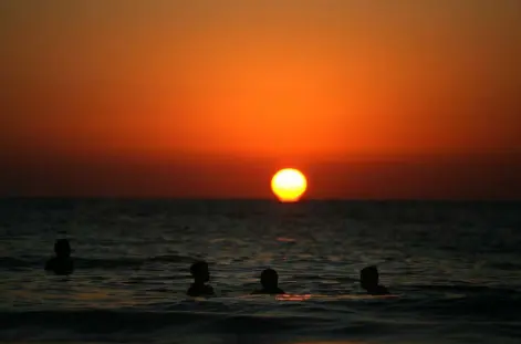  ?? Uriel Sinai, Getty Images ?? Israelis cool off in the water at the end of a hot summer’s day in Tel Aviv, Israel, in this file photo.