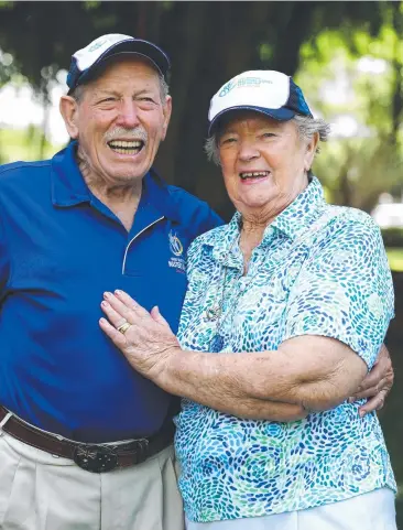  ?? Picture: BRENDAN RADKE ?? GOING THE DISTANCE: Ralph Schubert, pictured here with his number one supporter, wife Lillian, is at 89, the oldest competitor at this year’s Great Barrier Reef Master Games.