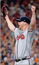  ?? Troy Taormina-USA TODAY Sports ?? Atlanta Braves relief pitcher Will Smith celebrates after recording the final out in Game 6 of the 2021 World Series at Minute Maid Park on Nov. 2 in Houston.