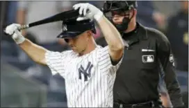  ?? KATHY WILLENS — THE ASSOCIATED PRESS ?? The Yankees’ Brett Gardner is not happy after striking out in the ninth inning against the Red Sox in New York on Thursday. Home plate umpire Stu Scheurwate­r, right, looks on.