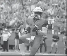  ?? The Associated Press ?? ORANGE YOU GLAD: Syracuse’s Dontae Strickland dances in the end zone Saturday after scoring a touchdown in the fourth quarter of the Orange’s 30-7 win against Florida State in Syracuse, N.Y.