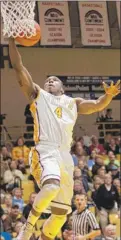  ?? MITCHELL/FOR THE POST-TRIBUNE
| CHARLES ?? Valparaiso’s LaVonte Dority goes up for a layup against Milwaukee during their game on Jan. 18.