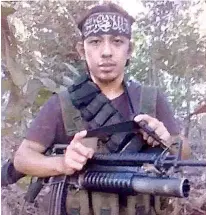  ?? CONTRIBUTE­D FOTO ?? FALLEN. An alleged commander of the Abu Sayyaf, Muamar Askali, alias Abu Rami, reportedly died in combat. The police have yet to submit specimens for DNA test, though.