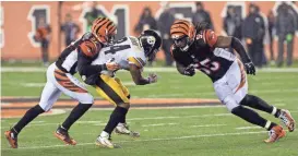  ?? AARON DOSTER, USA TODAY SPORTS ?? Bengals linebacker Vontaze Burfict, right, is suspended for Sunday’s game for this hit on Steelers wideout Antonio Brown.