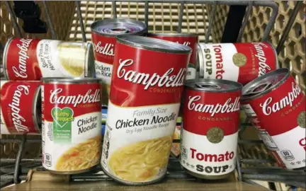  ?? ROSS D. FRANKLIN — THE ASSOCIATED PRESS FILE ?? Campbell Soup Co. plans to focus on its core snacks and soup business in North America and sell its internatio­nal business, paying down debt. The Camden, N.J., company said Thursday it’s working urgently to complete all the moves by next July.