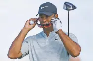  ?? DANTE CARRER/ASSOCIATED PRESS ?? Tiger Woods said: ‘I didn’t feel like I made contact twice. In slow motion, you can see I did hit it twice. But in real time, I didn’t feel that at all.’