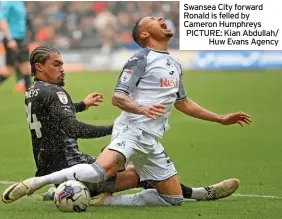  ?? ?? Swansea City forward Ronald is felled by Cameron Humphreys PICTURE: Kian Abdullah/ Huw Evans Agency