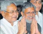  ?? AP DUBE/HT ?? Bihar chief minister Nitish Kumar with deputy CM Sushil Modi at the oath ceremony of ministers at Raj Bhawan.