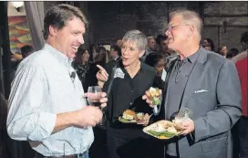  ?? CONTRIBUTe­d BY PHIL SKINNeR ?? Cox COO Alex Taylor (left) talks with Patty and Guy Tucker during the Food Well Alliance’s second annual Love Local event at the King Plow Arts Center recently.