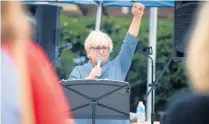  ?? TELECHAN / POST-TRIBUNE KYLE ?? State Sen. Karen Tallian, D-Portage, raises her fist in solidarity as she speaks Oct. 2 in Valparaiso during a rally in support of reproducti­ve rights.