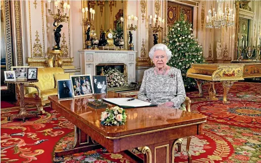  ?? AP ?? Queen Elizabeth poses for a photograph after she recorded her annual Christmas Day message, in the White Drawing Room of Buckingham Palace, London.