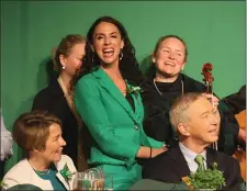  ?? NANCY LANE — BOSTON HERALD ?? Auditor Diana DiZoglio takes the stage to sing during the St. Patrick’s Day Breakfast Sunday.
