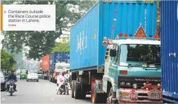  ?? Online ?? Containers outside the Race Course police station in Lahore.