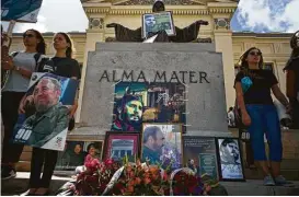  ?? Ramon Espinosa / Associated Press ?? In Havana, an impromptu memorial pays tribute to Fidel Castro. Officials says Castro’s body will be cremated and interred at the Santa Ifigenia cemetery.