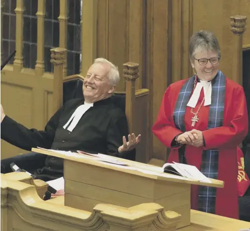  ??  ?? 0 Moderator Right Rev Dr Susan Brown addresses the Assembly, with principal Clerk Rev Dr George Whyte joining in the merriment