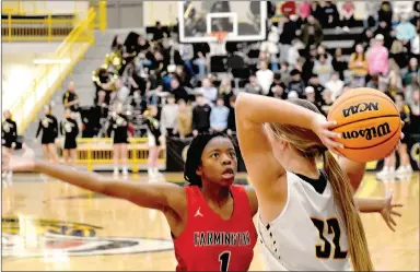  ?? MARK HUMPHREY ENTERPRISE-LEADER ?? Farmington’s high pressure defense, shown by J’Myra London guarding an in-bounder at Prairie Grove, helped the Lady Cardinals win 74-53 on the road at Gravette in 4A-1 girls basketball action on Tuesday, Jan. 18 with London scoring four points.