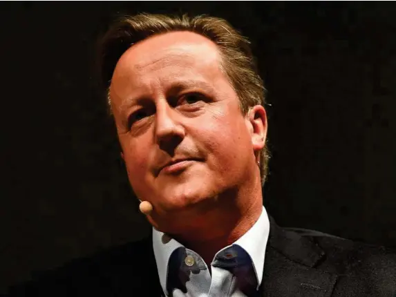  ?? (PA) ?? David Cameron urges ministers to ‘roll up your sleeves’