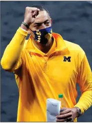  ?? (AP/AJ Mast) ?? Michigan Coach Juwan Howard said after Sunday’s victory over LSU that it would take multiple Wolverines to step up to cover for versatile veteran Isaiah Livers, who is out indefinite­ly with a foot injury diagnosed during the Big Ten Tournament. So far, they’ve responded. “We have a very deep roster. So the next-man-up mentality is never to disrespect a player’s injury, [it’s] to always feel that you got your brother’s back,” Howard said.