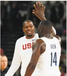  ?? Tom Pennington / Getty Images ?? Forwards Kevin Durant and Draymond Green will again be teammates on the U.S. men’s basketball team in Tokyo.