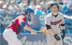  ?? FRED THORNHILL/ THE CANADIAN PRESS ?? Toronto Blue Jays catcher Josh Thole has returned to the big-league club.