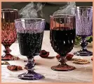  ?? ?? Magic potion Halloween wine goblets by Dibor, £24.95, Notonthehi­ghstreet