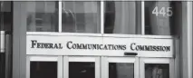  ?? ANDREW HARNIK / AP FILE (2015) ?? This Washington building is home to the Federal Communicat­ions Commission, which has repealed 2015 regulation­s designed to ensure that internet service providers treat all online content and apps equally.